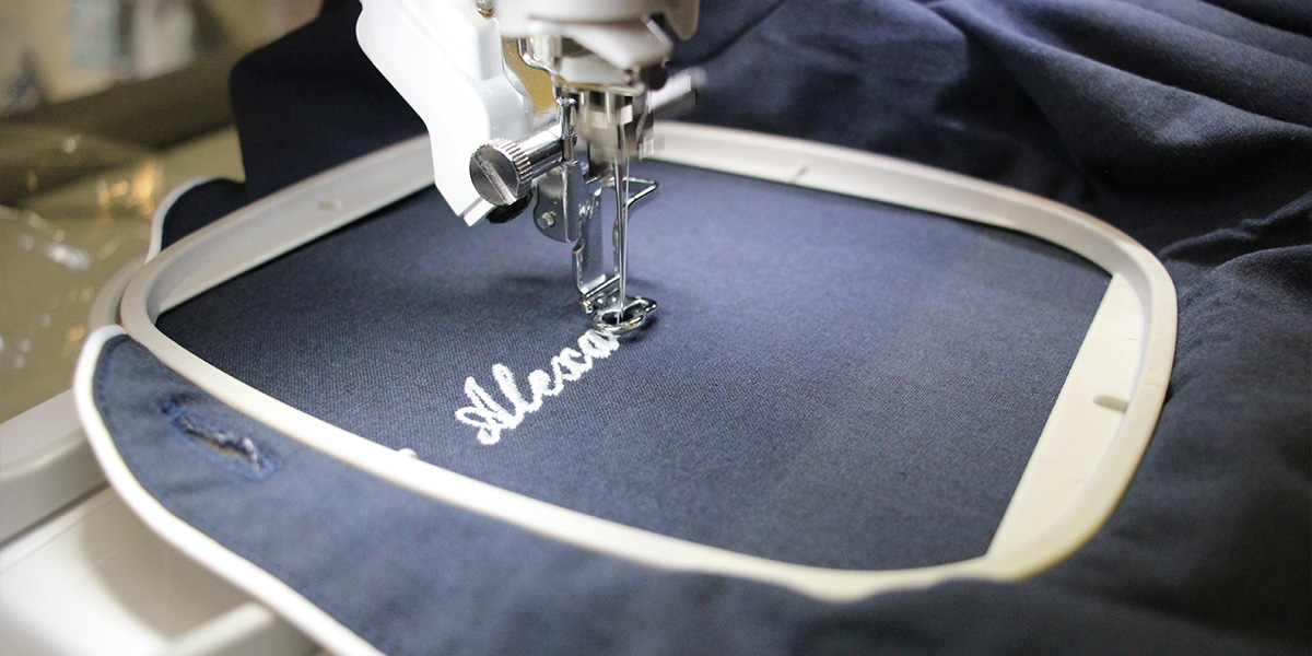 Service de broderie le tablier bobine
