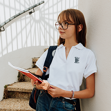 Polo fille, manches courtes, blanc, brodé au logo de votre établissement