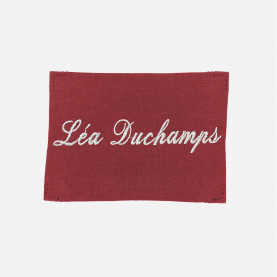 Coupon de tissu grenat à coudre