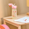 Gourde paille en plastique rose imprimé
