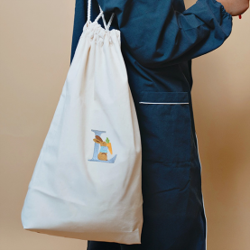 Sac de change lapin fleurs avec lettre personnalisable bleue