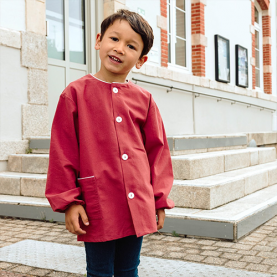 Tablier d'école grenat de la marque Le Tablier Bobine.